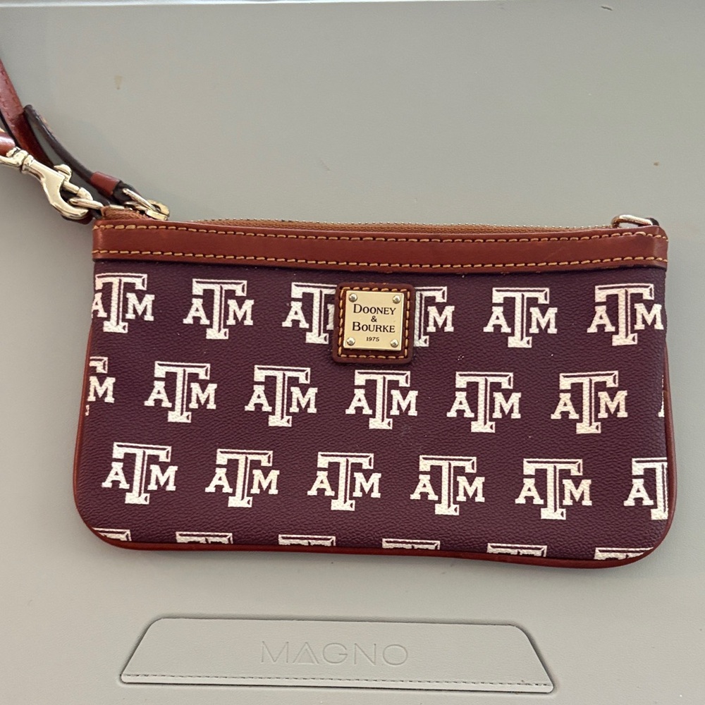 Dooney & Bourke Burgundy Wristlet with A&M Pattern